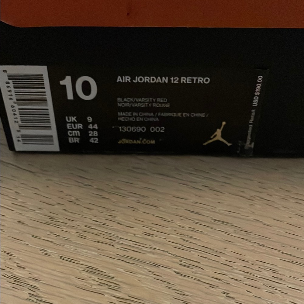 Air Jordan 12 Retro Black and Red Sneakers